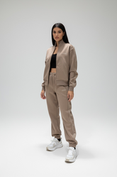 GUESS Tuta Donna In Cotone Con Bande Logo Brillantinati Felpa Con Zip Beige