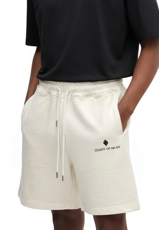 County of milan COUNTY OF MILAN Marcelo Burlon Pantaloncino Basic Beige - Pantaloncini - Tommaseo Clothing