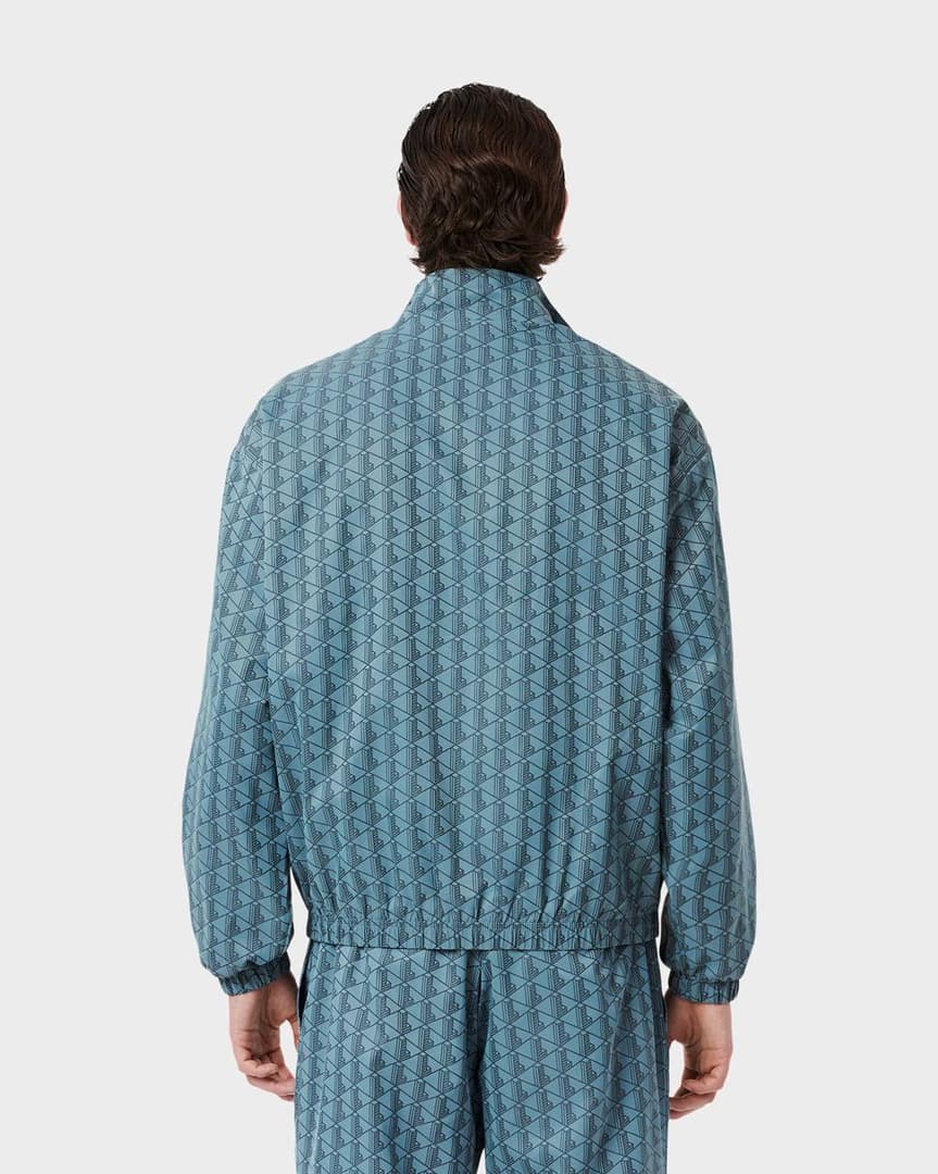 LACOSTE Tuta Monogram In Microfibra Con Zip Azzurra