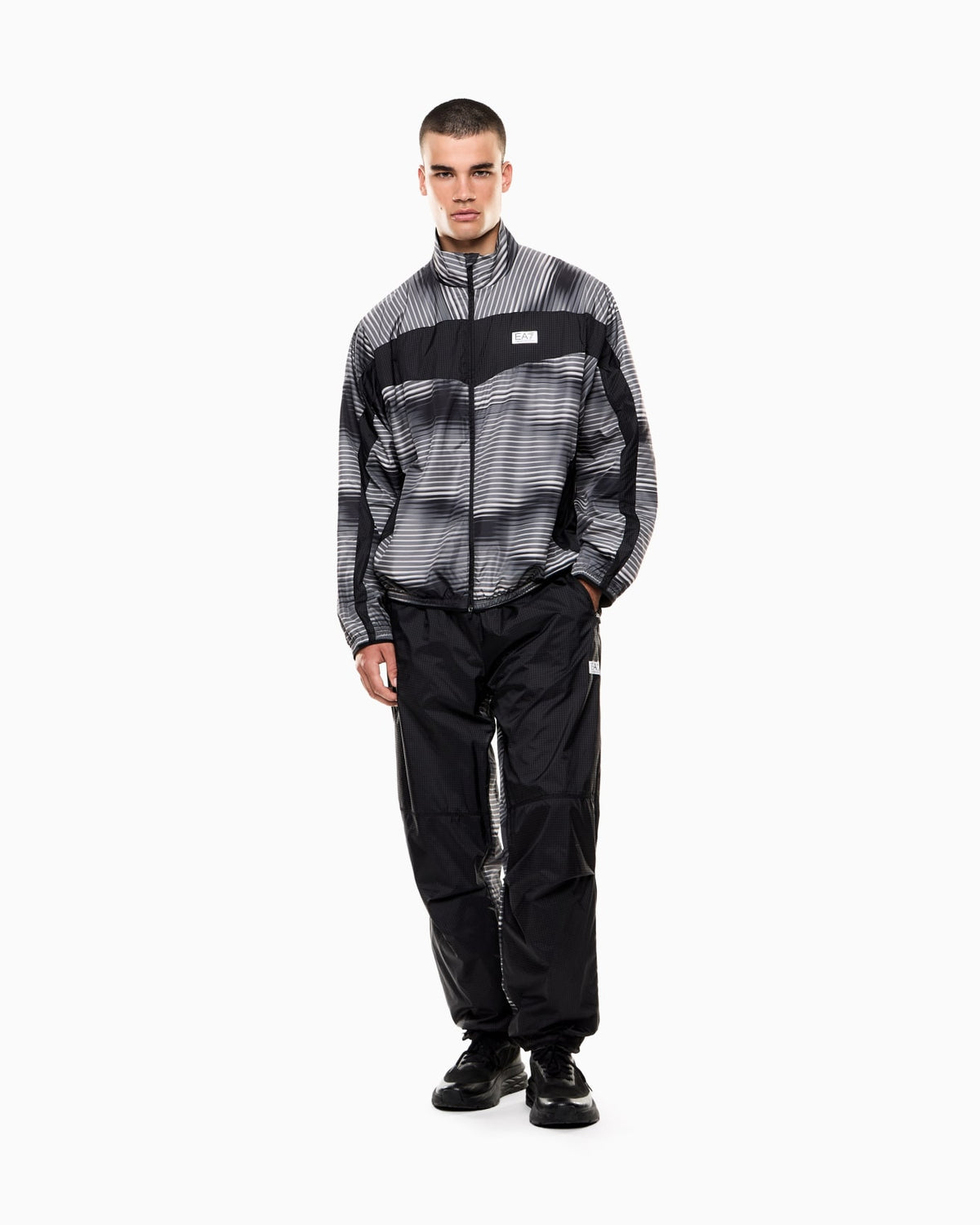 Armani EMPORIO ARMANI Tuta In Microfibra Dynamic Atlete Fantasia a Righe Grigia/Nera - Tuta completa - Tommaseo Clothing