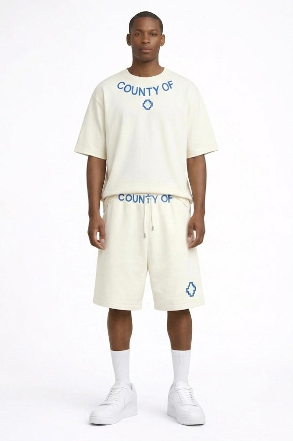 County of milan COUNTY OF MILAN Marcelo Burlon Completino Con Stampa Logo Su T-Shirt E pantaloncino Beige/Blu - COMPLETI