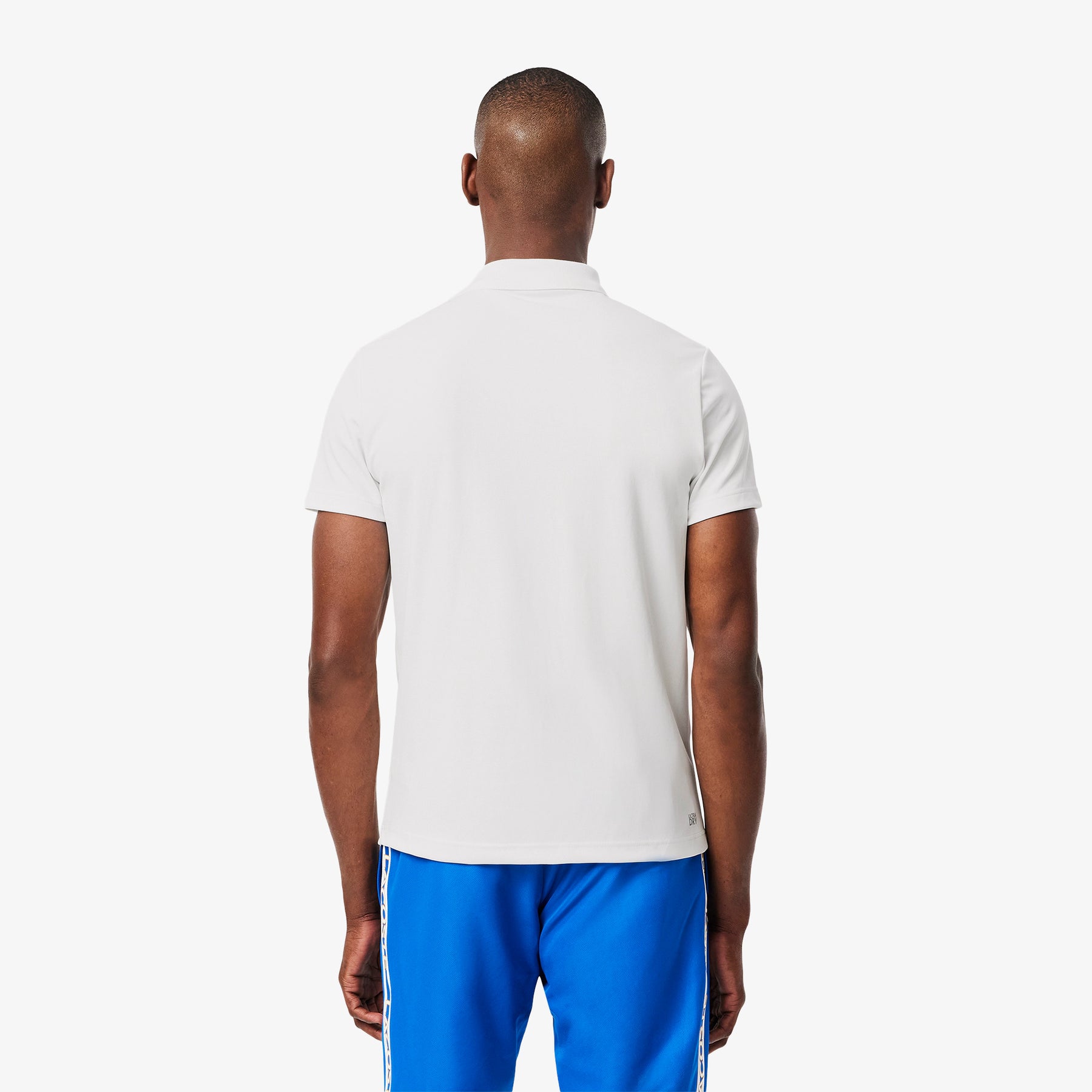 LACOSTE Polo con Banda Verticale in Tessuto Tecnico Bianca\Blu