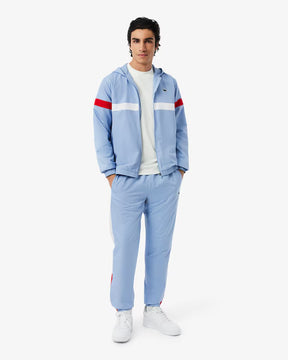 LACOSTE Tuta Con Banda Colorata In Microfibra Azzurra