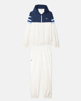 LACOSTE Tuta Leggera In Microfibra Con Zip e Logo Laterale Bianca/Blu/Celeste