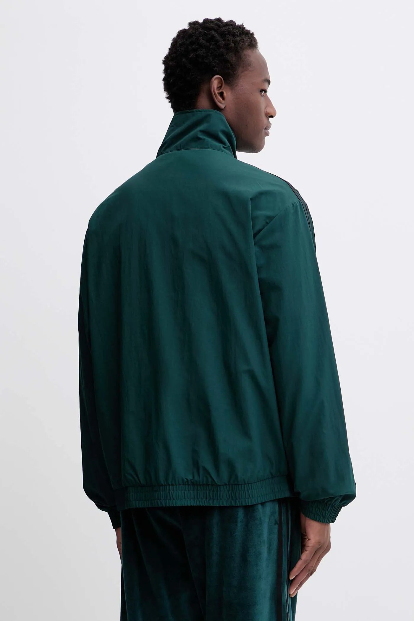 ADIDAS ORIGINALS Tuta In Microfibra Con Zip Senza Cappuccio Con Strisce Laterali Verde/Nera  25/26