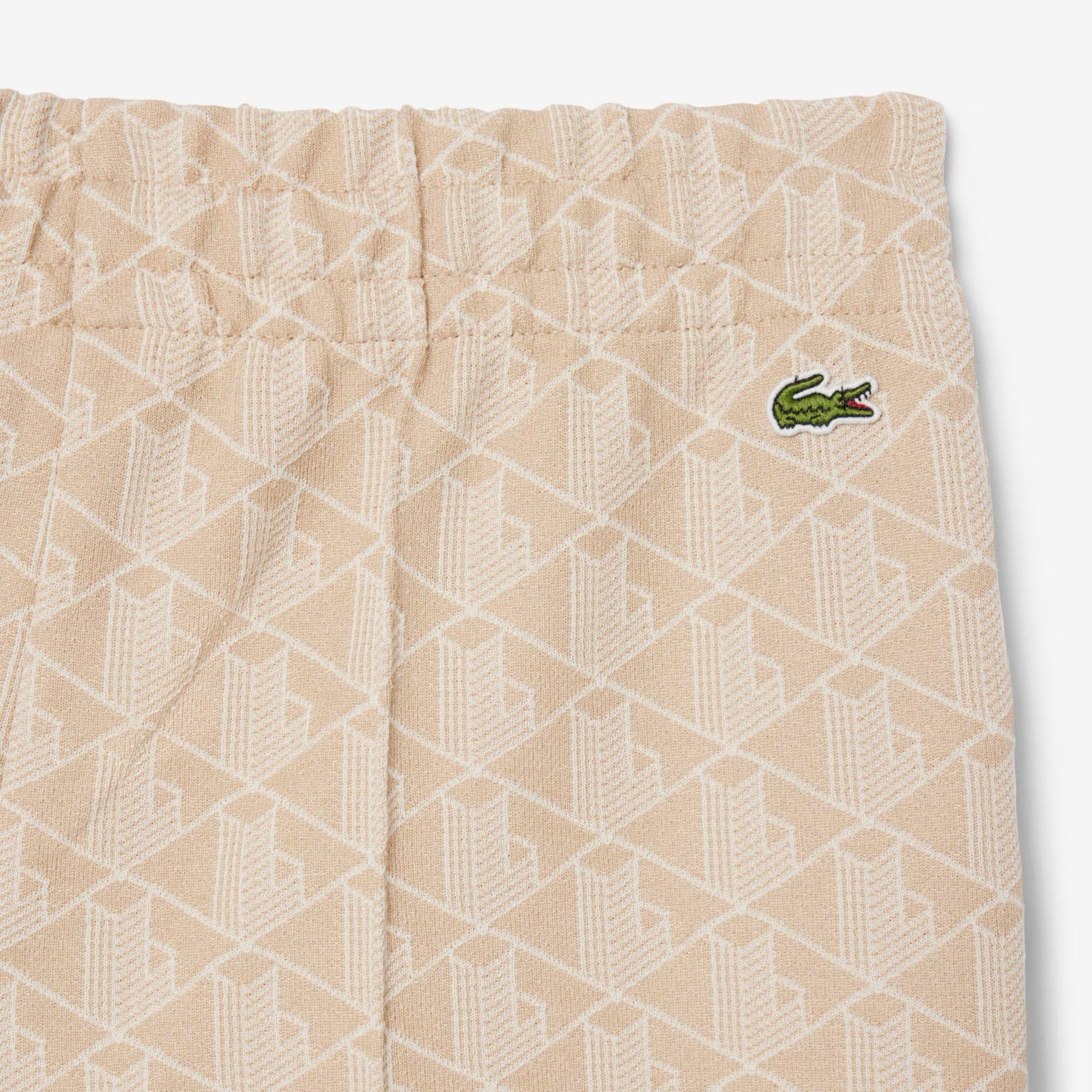 LACOSTE Tuta Monogram Donna Panna