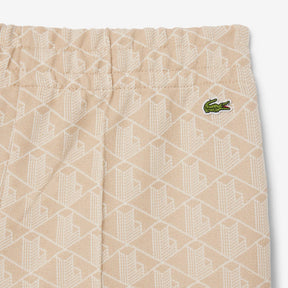 LACOSTE Tuta Monogram Donna Panna
