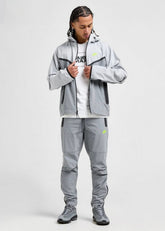 NIKE Tuta Tech Leggera In Microfibra Con Zip e Cappuccio Grigia Logo Fluo