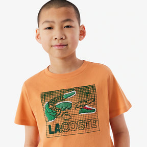 LACOSTE T-Shirt in Cotone con Stampa Grafica Bambino/Bambina Arancione
