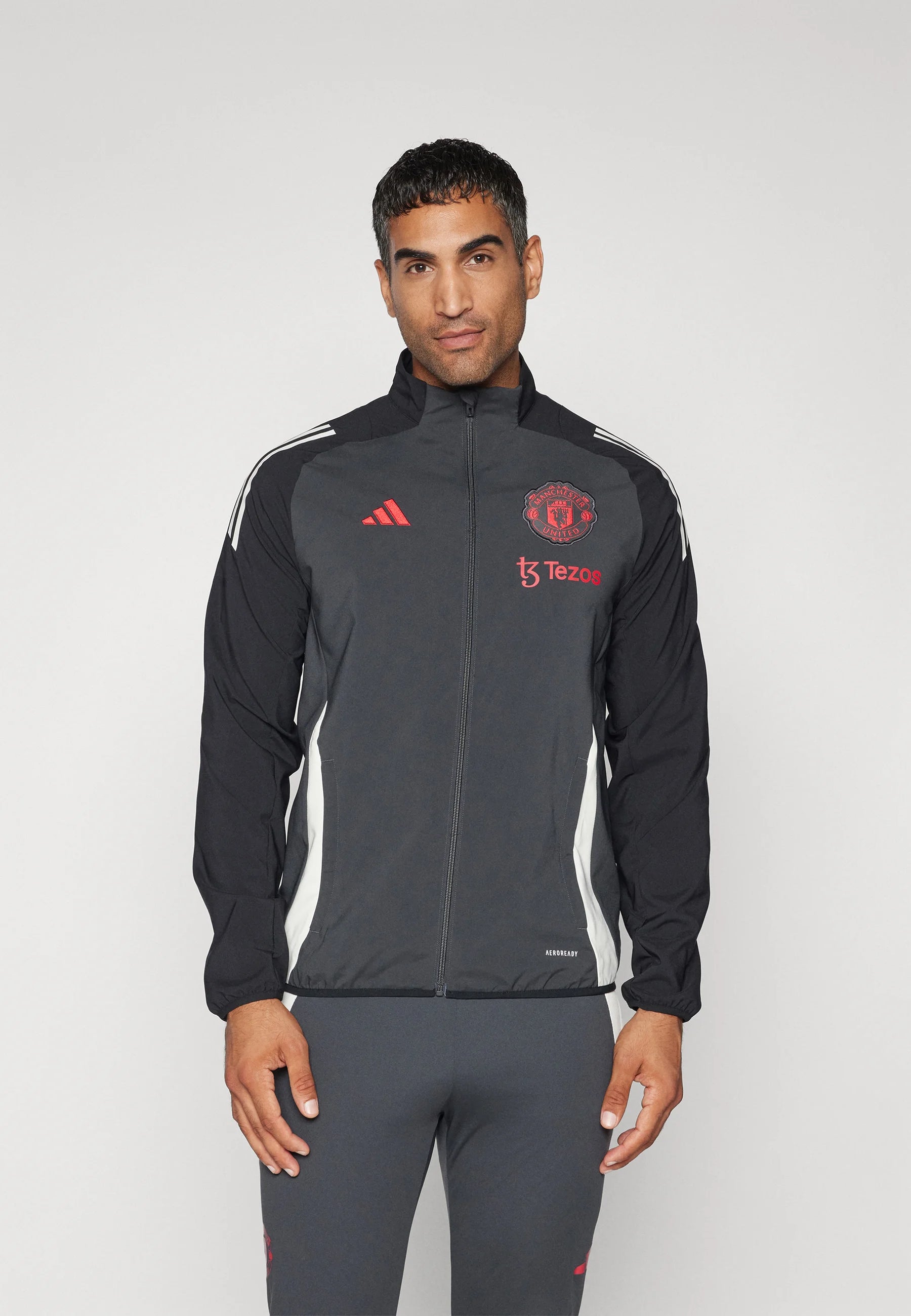 ADIDAS Tuta Manchester United Leggera In Microfibra Con Zip Grigia/Rossa