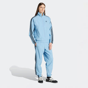 ADIDAS ORIGINALS Tuta In Microfibra Con Zip Senza Cappuccio Con Strisce Laterali Azzurra/Nera  25/26