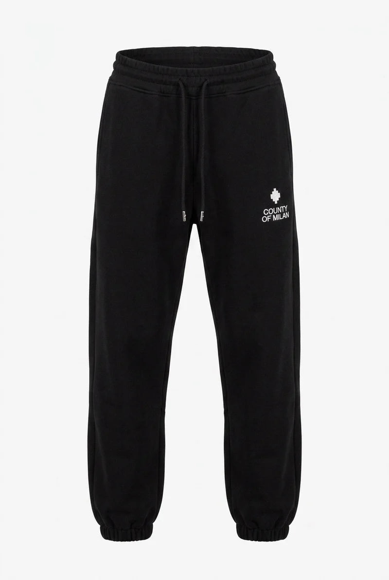 COUNTY OF MILAN Pantalone Di Tuta Marcelo Burlon Nero Con Logo Ricamato Bianco
