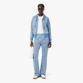 LACOSTE Tuta Monogram Donna Celeste